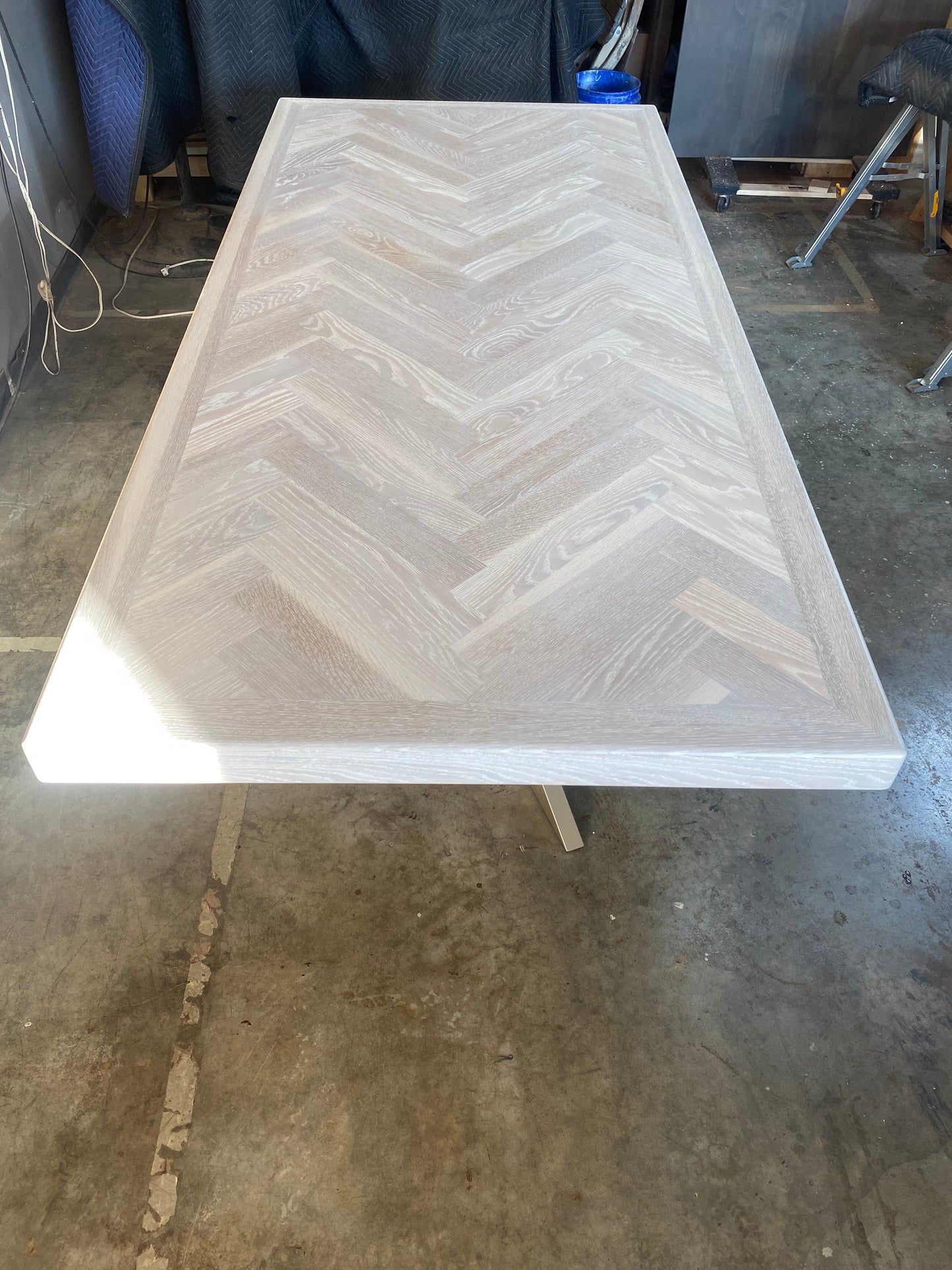 Whitewash Artisan Dining Table - Herringbone Design With Modern Metal Pedestal Base