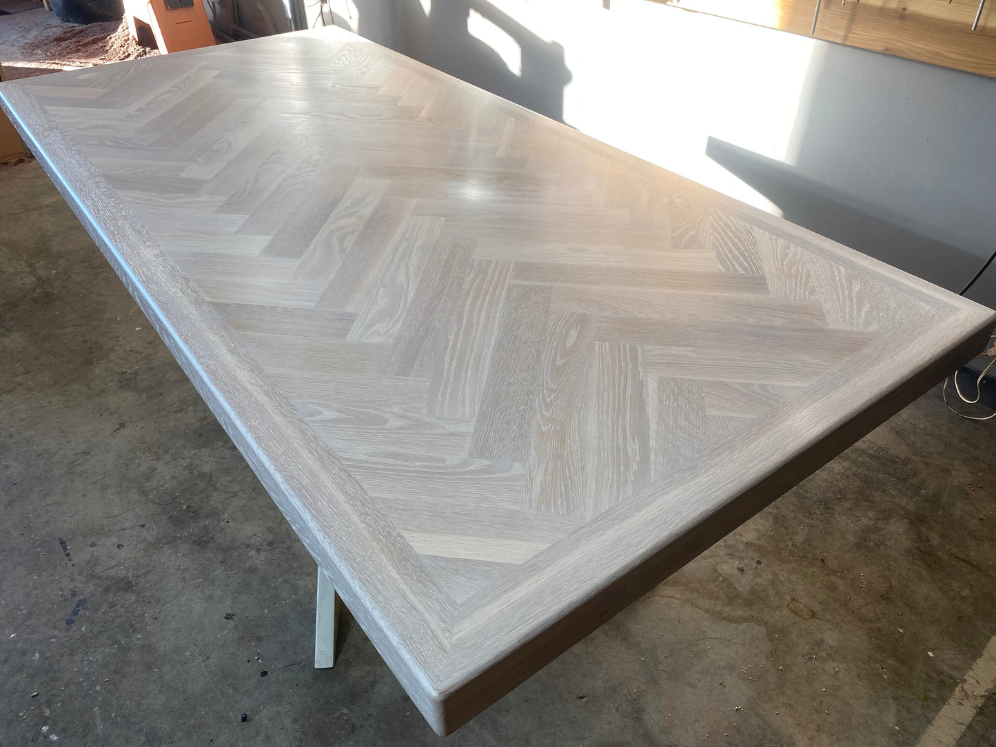 Whitewash Artisan Dining Table - Herringbone Design With Modern Metal Pedestal Base