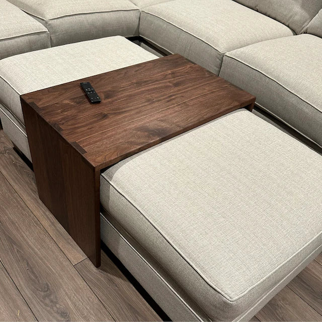 Handmade table made to fit over clients exiting ottoman. Made in walnut wood in Columbus ohio. 