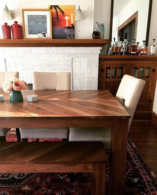 Herringbone trestle dining table, Mission dining table with X base, modern farmhouse dining table handmade in columbus ohio, parsons dining table, four leg dining table with bench handmade in columbus ohio, new albany, upper arlington, cleveland, cincinnati, sandusky, johnstown, bexley, bexely, contemporary dining table, dining table with matching bench, walnut dining table, elegant dining table, chunky four leg dining table, traditional dining table
