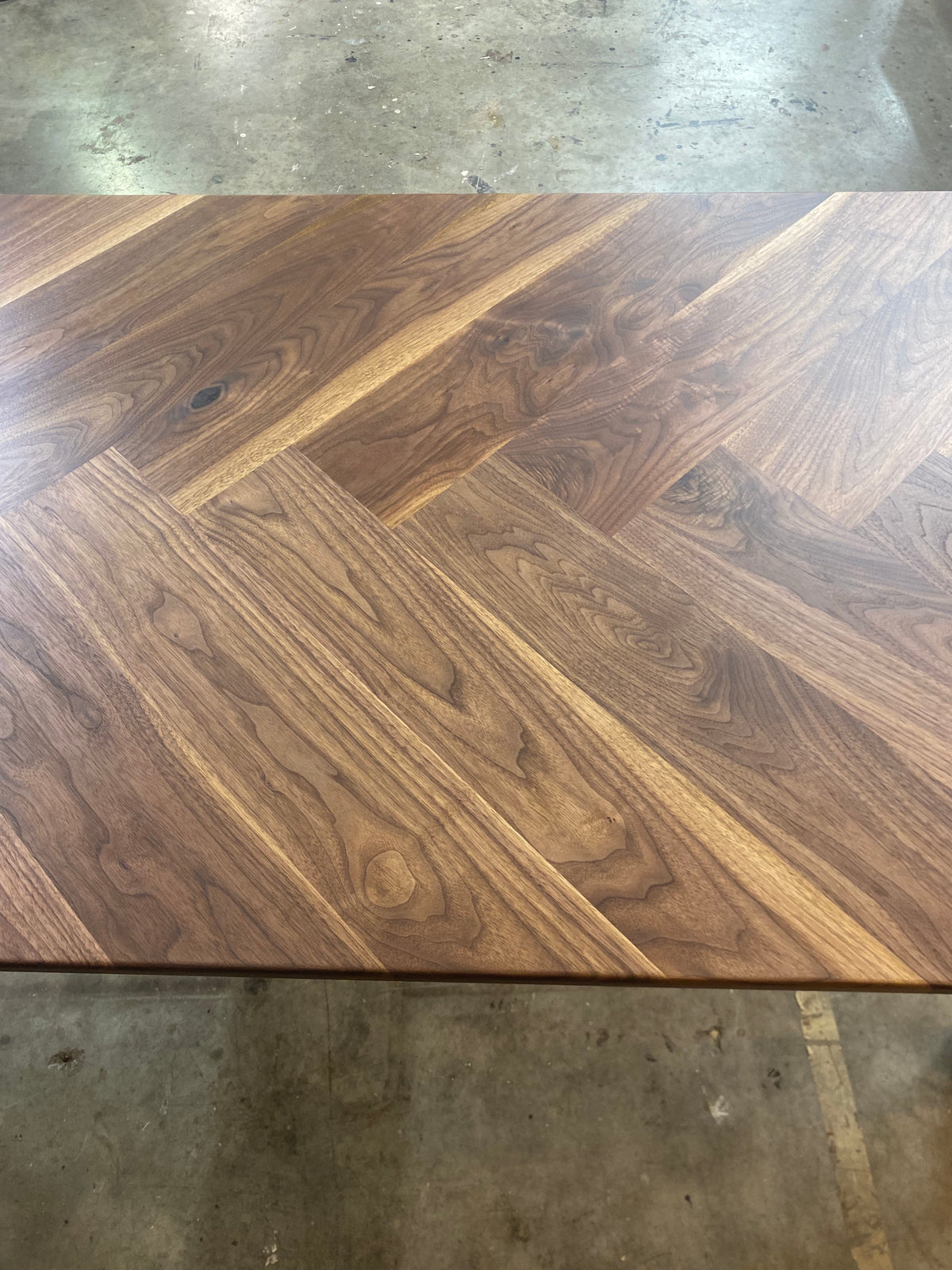 Stunning Herringbone Dining table with Solid Walnut Traditional Trestle Base