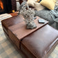 Handmade walnut table fitted over a customers leather ottoman