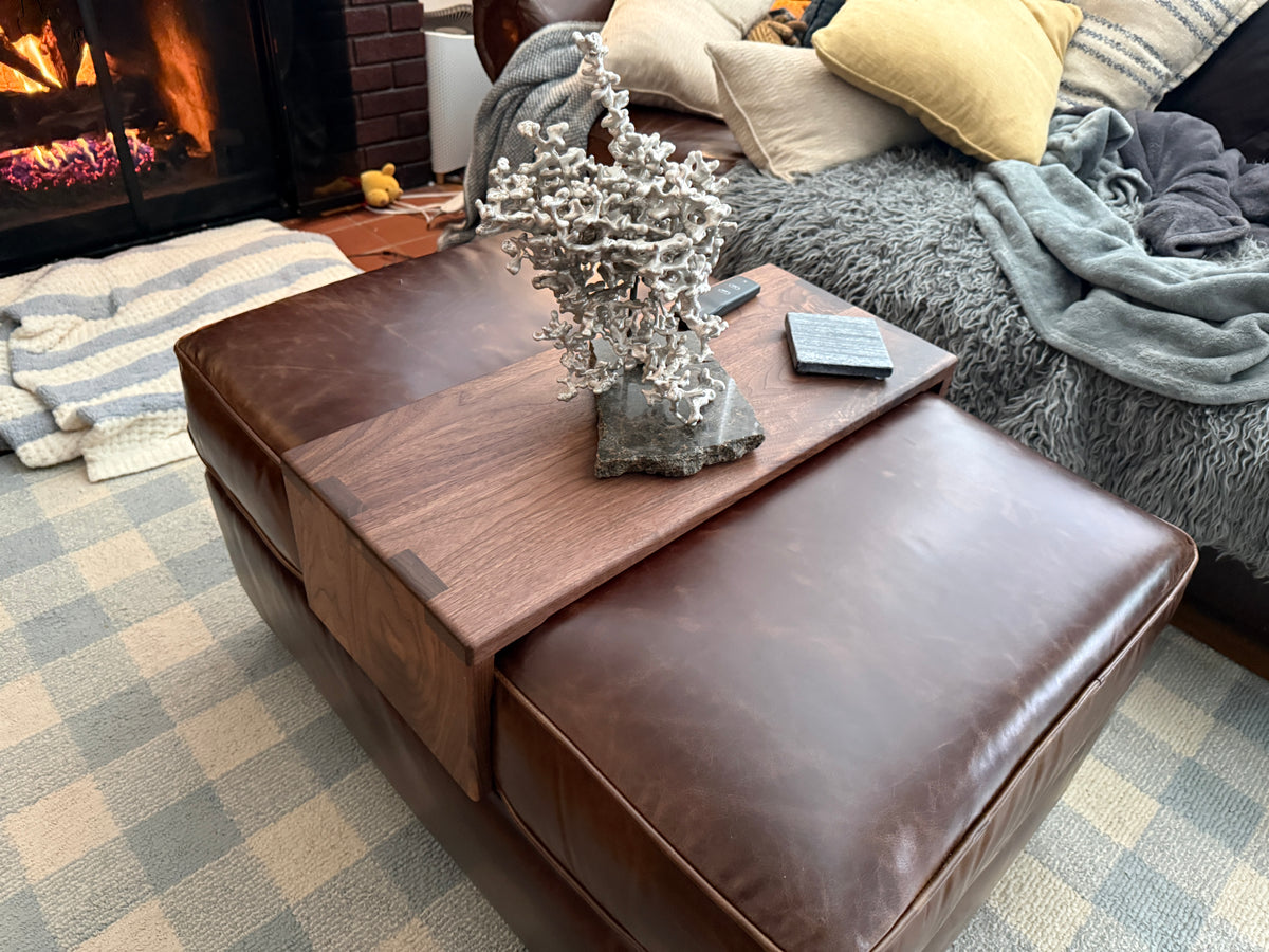 Handmade walnut table fitted over a customers leather ottoman