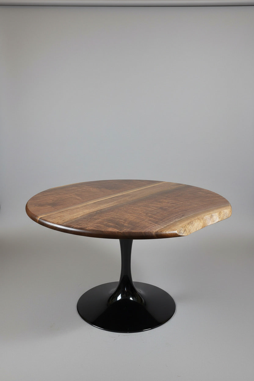 one of a kind round dining table with natural walnut slab slab made in columbus ohio, tulip base, gloss black tulip base, walnut live edge, walnut slab, walnut dining table, hardwood dining table, handmade dining table in ohio, made in use, made in america, local business, small business, luxury furniture, bespoke furniture