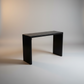 black hardwood console table sitting in the studio, hand made in america