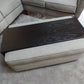 a modern ottoman tray with 6" tall sides. Shown custom fitted over clients grey fabric ottoman.