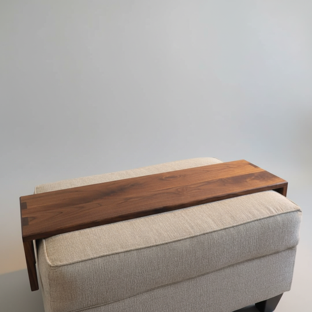 modern wood ottoman tray with fitted sides sitting on a fabric ottoman