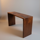 studio shot of walnut watefall console table, hand made in america, made and sourced in Columbus Ohio
