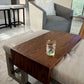 Wooden ottoman tray fitted to a cream leather ottoman with metal legs