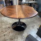 one of a kind round dining table with natural walnut slab slab made in columbus ohio, tulip base, gloss black tulip base, walnut live edge, walnut slab, walnut dining table, hardwood dining table, handmade dining table in ohio, made in use, made in america, local business, small business, luxury furniture, bespoke furniture