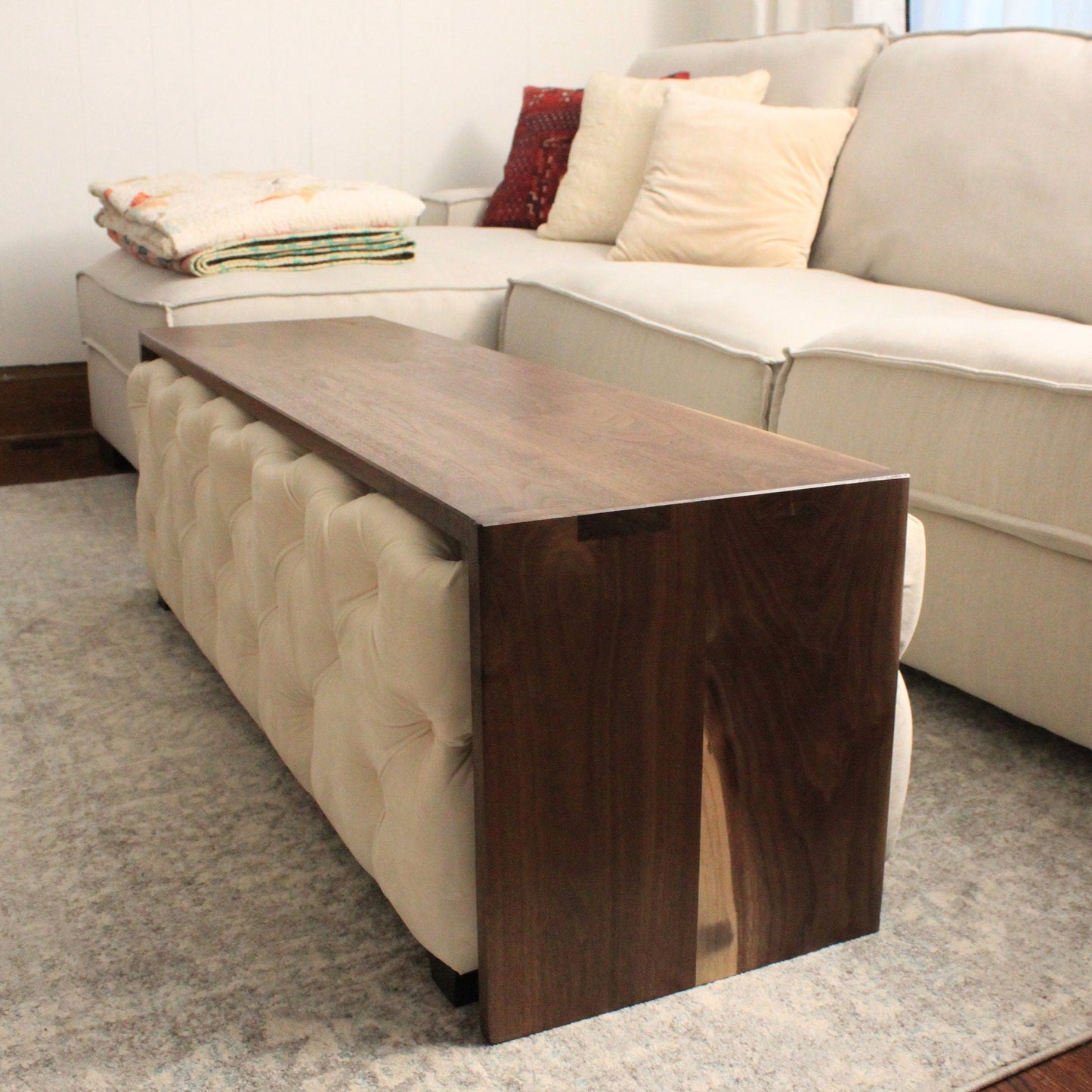 ottoman coffee table, walnut coffee table handmade in columbus ohio, ottoman table overlay, custom overlay for ottoman, wood ottoman cover, waterfall ottoman table, over ottoman coffee table,