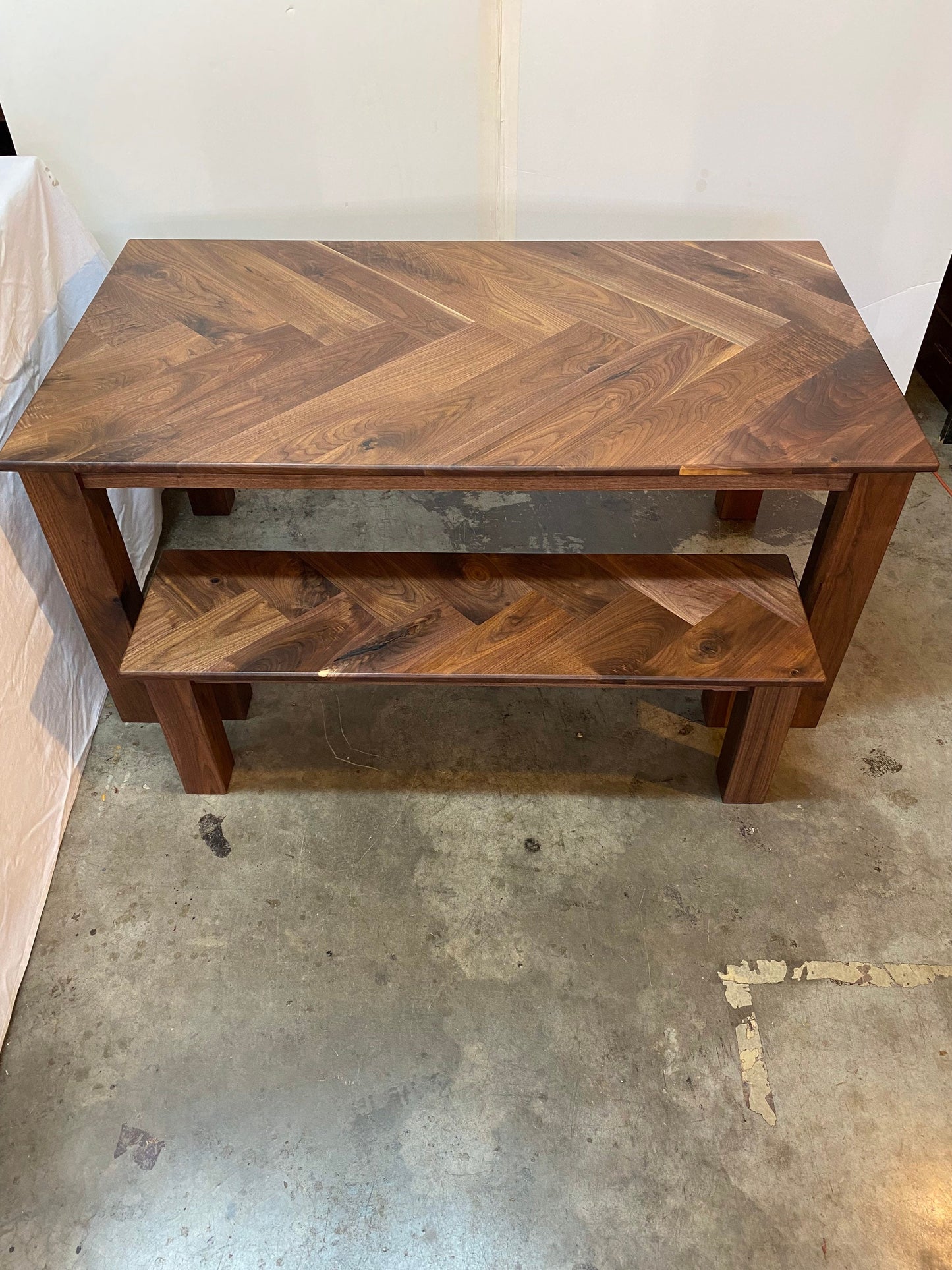 modern farmhouse dining table, walnut dining table with herringbone table top handmade in columbus ohio, matching herringbone bench, parsons style dining table with 4 legs, chunky design